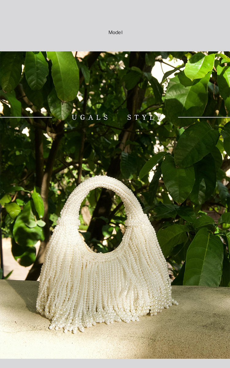 Designer-Clutch mit Perlengrif – Luxury Bags Collection Bewertung und Preis